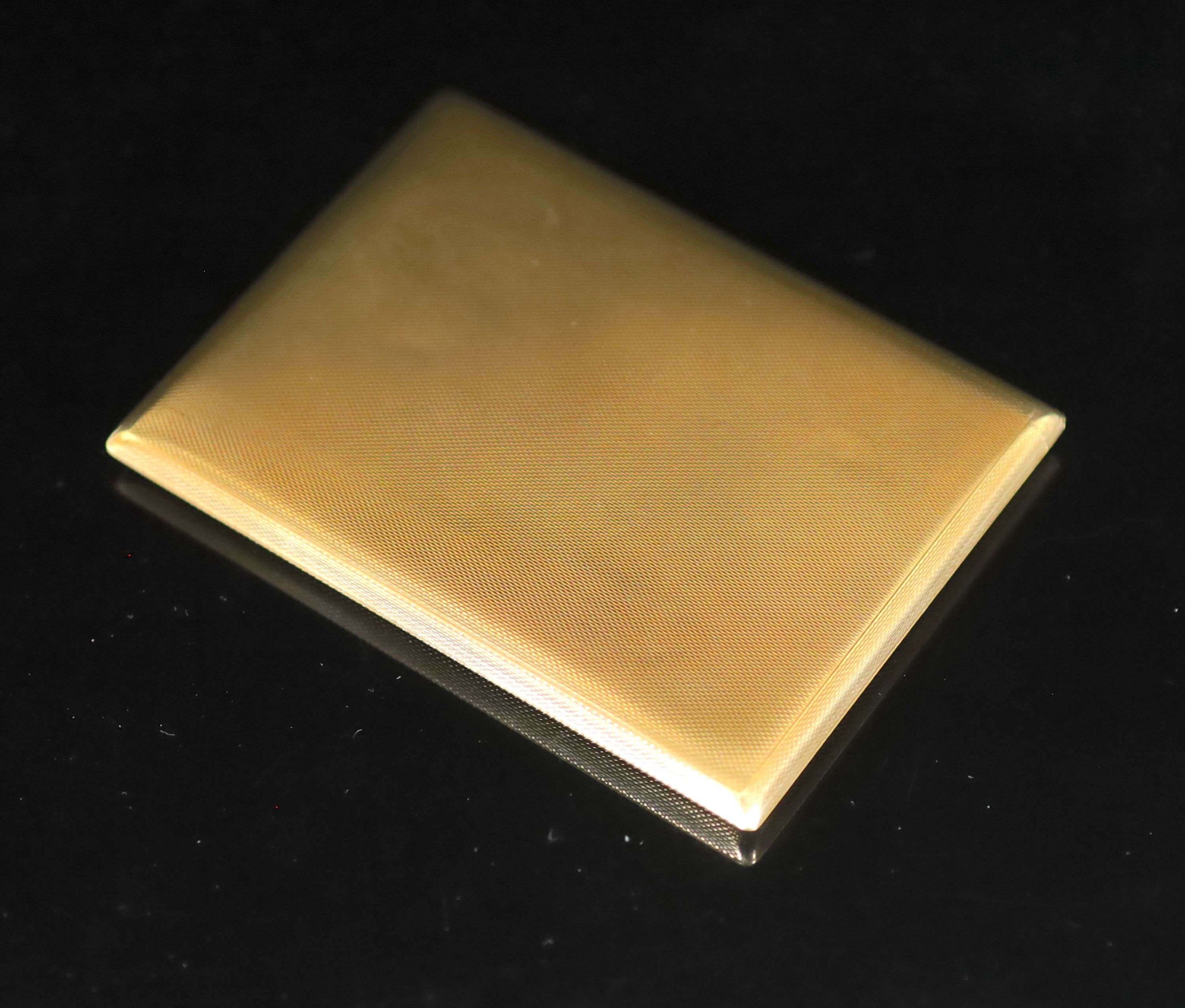 A 1950's Garrard & Co engine turned 9ct gold cigarette case